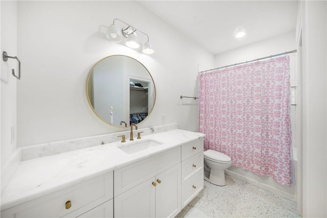 bathroom with vanity, toilet, and shower / bathtub combination with curtain