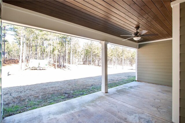 view of patio featuring ceiling fan