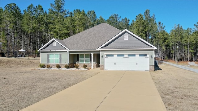 craftsman house with a garage