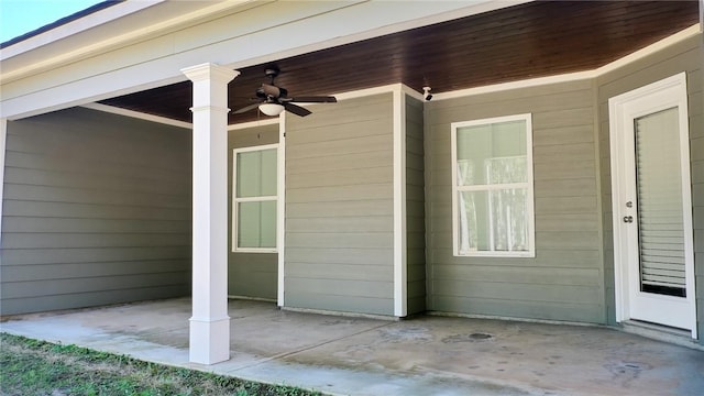 view of patio featuring ceiling fan