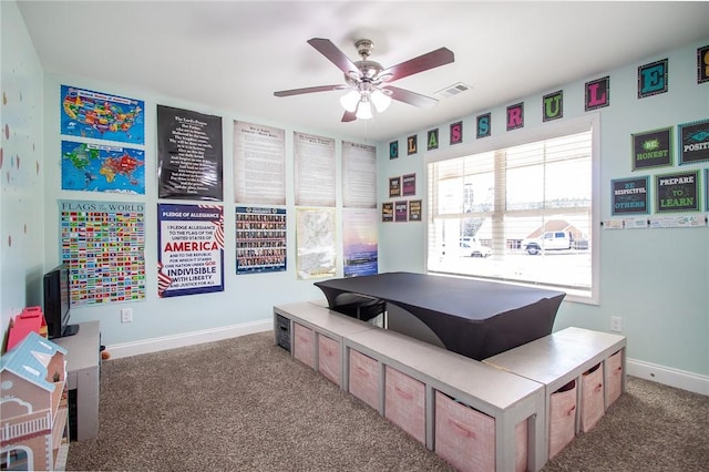 game room with carpet floors and ceiling fan