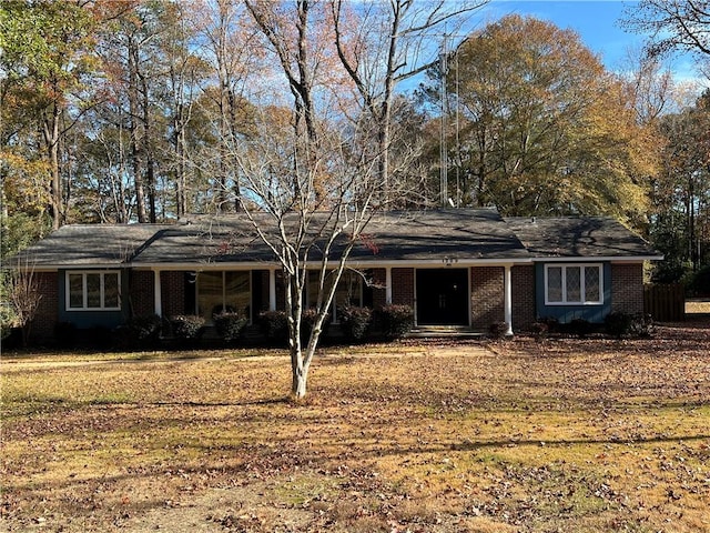 single story home with a front yard