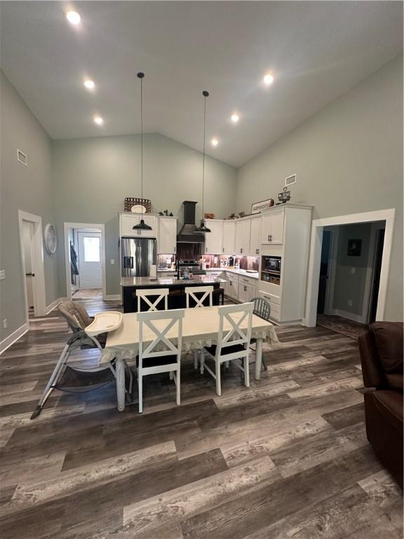 301 Lee Road 994, Cusseta, AL 36852 - dining area featuring high vaulted ceiling, recessed lighting, dark wood-type flooring, and visible vents