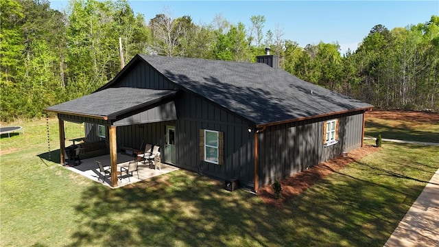 301 Lee Road 994, Cusseta, AL 36852 - view of outbuilding featuring a trampoline and a forest view