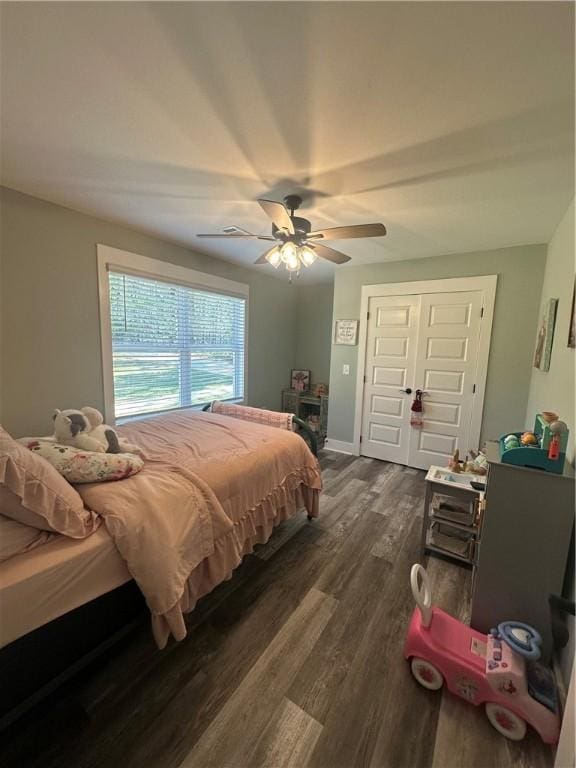 301 Lee Road 994, Cusseta, AL 36852 - bedroom with a closet, ceiling fan, baseboards, and dark wood-style floors