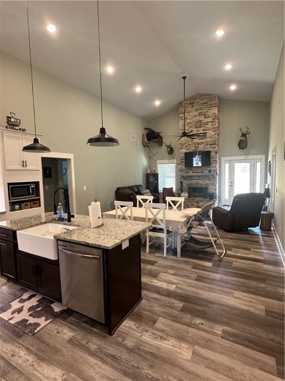 301 Lee Road 994, Cusseta, AL 36852 - kitchen with open floor plan, dishwasher, dark wood-style flooring, and a sink