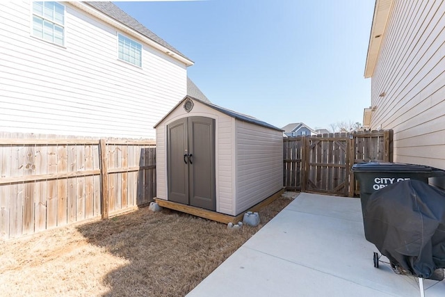 view of shed featuring a fenced backyard