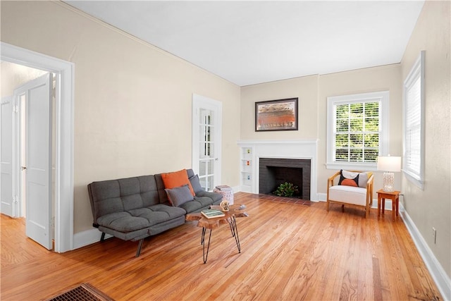 living room with light hardwood / wood-style floors