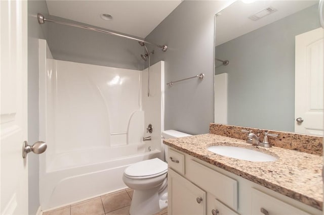 735 Hunter Ct, Auburn, AL 36832 - full bath with tile patterned floors, toilet, vanity, and washtub / shower combination