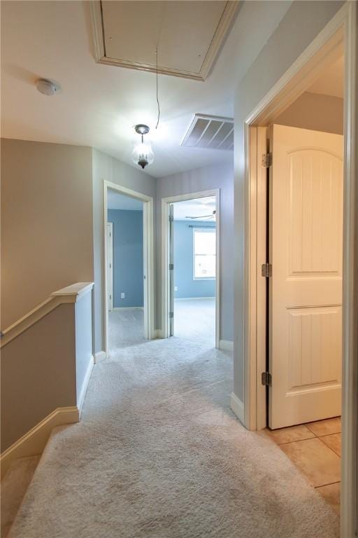 735 Hunter Ct, Auburn, AL 36832 - hallway featuring attic access, light carpet, and baseboards