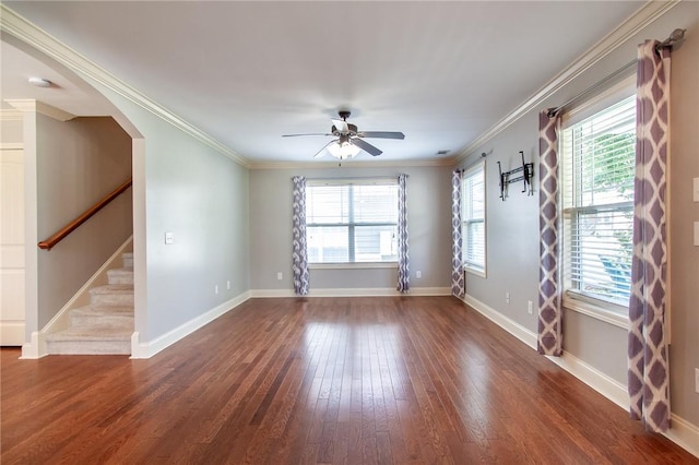 735 Hunter Ct, Auburn, AL 36832 - empty room featuring ceiling fan, wood finished floors, crown molding, stairs, and arched walkways