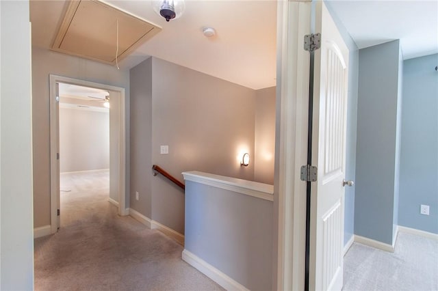 735 Hunter Ct, Auburn, AL 36832 - corridor featuring attic access, an upstairs landing, carpet, and baseboards