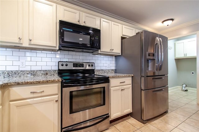 735 Hunter Ct, Auburn, AL 36832 - kitchen featuring appliances with stainless steel finishes, ornamental molding, light tile patterned flooring, tasteful backsplash, and light stone counters