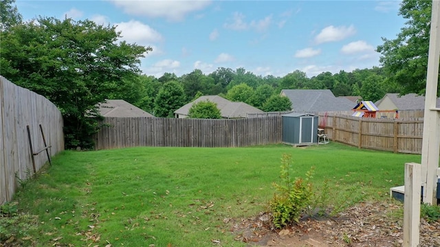 735 Hunter Ct, Auburn, AL 36832 - view of yard featuring a storage shed and an outdoor structure