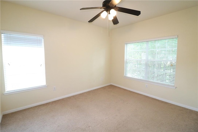 447 W Longleaf Dr Unit 805, Auburn, AL 36832 - unfurnished room featuring carpet floors, healthy amount of natural light, and ceiling fan