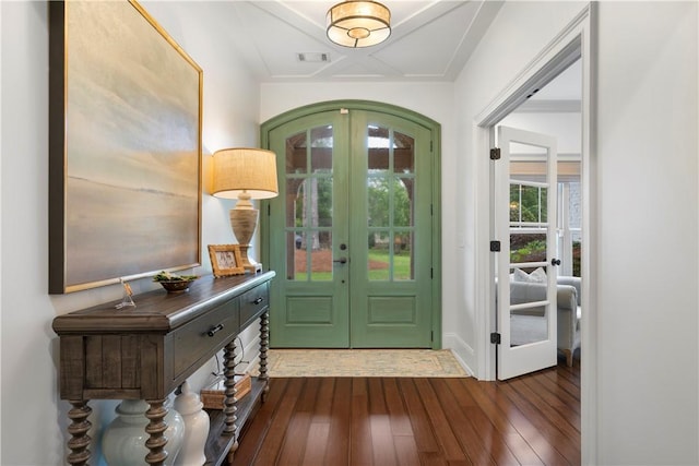 entrance foyer with french doors, visible vents, and dark wood-style flooring