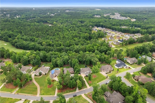 aerial view with a forest view and a residential view