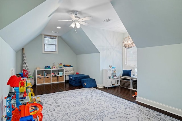 game room with lofted ceiling, wood finished floors, visible vents, and baseboards