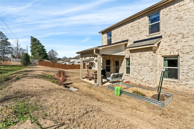 view of yard featuring a patio area and fence