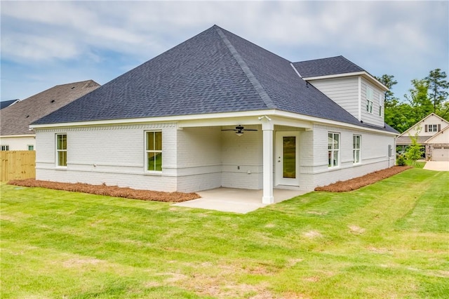 2022 Hidden Lakes Dr, Opelika, AL 36801 - back of property featuring ceiling fan, brick siding, a patio, and a shingled roof
