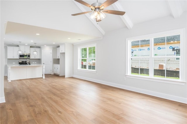 2022 Hidden Lakes Dr, Opelika, AL 36801 - unfurnished living room with baseboards, light wood finished floors, ceiling fan, and recessed lighting