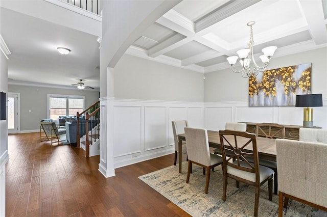 dining room with stairs, dark wood-style flooring, coffered ceiling, and beam ceiling