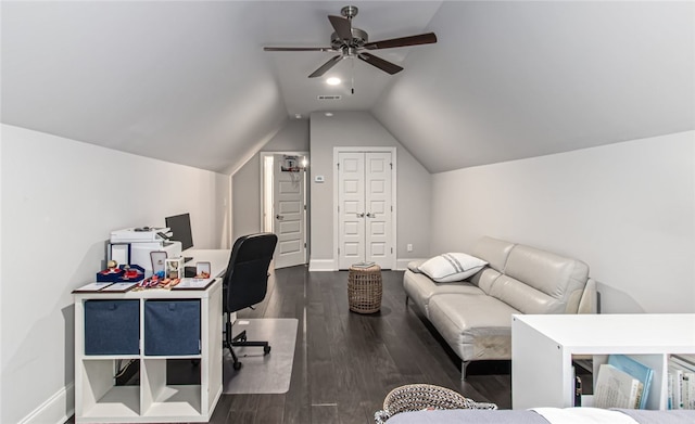 home office with ceiling fan, dark hardwood / wood-style floors, and vaulted ceiling