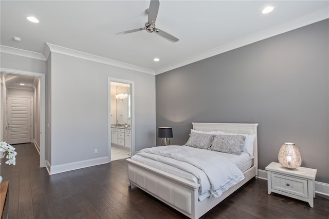 bedroom featuring crown molding, ceiling fan, dark wood-type flooring, and ensuite bathroom