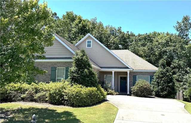 view of front of home with a front yard