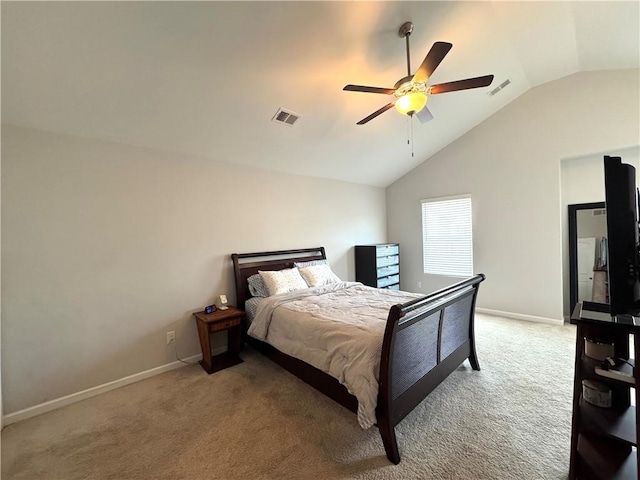 bedroom featuring carpet, visible vents, and vaulted ceiling