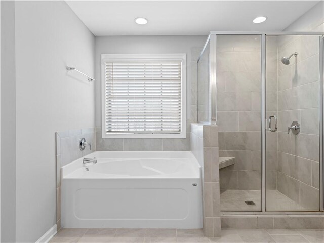 full bathroom with tile patterned flooring, a garden tub, recessed lighting, and a stall shower