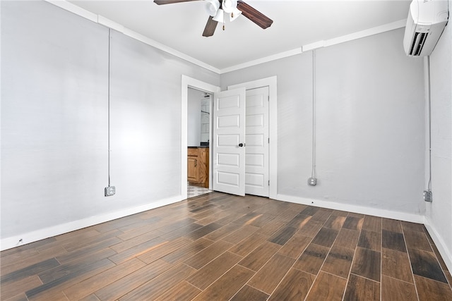 spare room with ceiling fan, ornamental molding, and a wall mounted AC