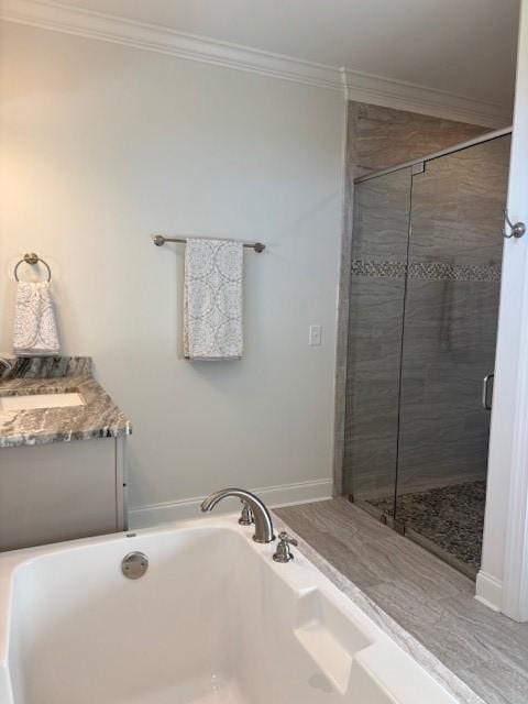 bathroom with vanity, walk in shower, and crown molding