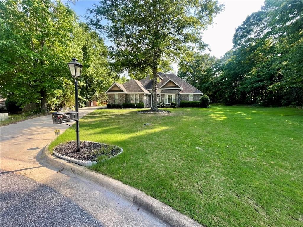 103 Tallyho Ct, Auburn, AL 36832 - view of front of property with stone siding and a front lawn