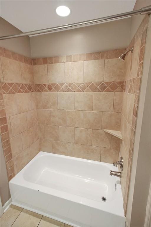 bathroom featuring bathing tub / shower combination, tile patterned flooring, and recessed lighting
