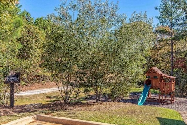 exterior space featuring playground community