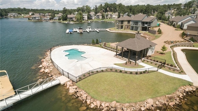 aerial view featuring a water view and a residential view