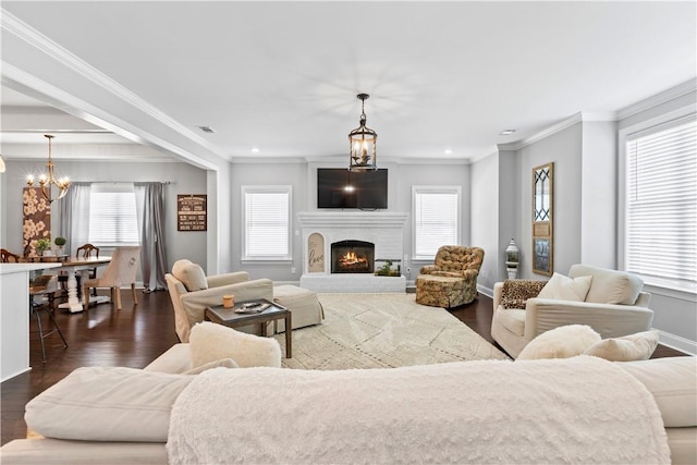 2409 Meadow Cove Rd, Auburn, AL 36832 - living area with a chandelier, healthy amount of natural light, dark wood finished floors, crown molding, and recessed lighting