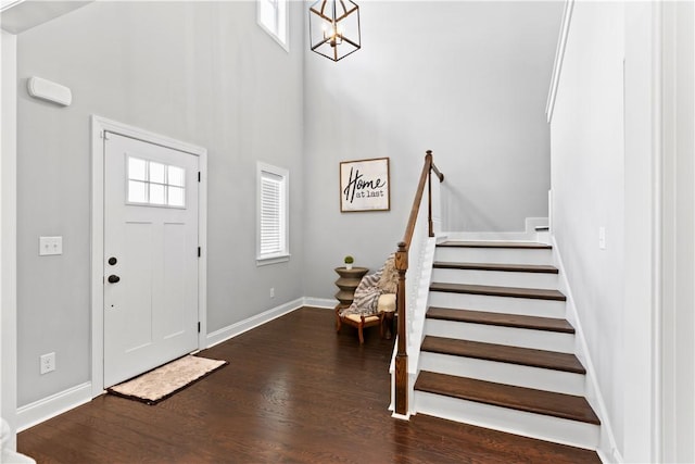 2409 Meadow Cove Rd, Auburn, AL 36832 - foyer with wood finished floors, stairway, a high ceiling, and a chandelier