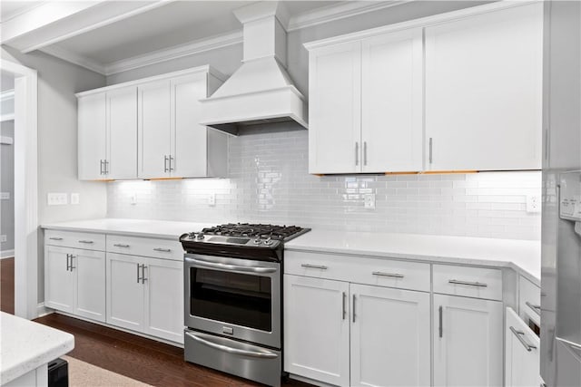 2409 Meadow Cove Rd, Auburn, AL 36832 - kitchen with stainless steel range with gas cooktop, premium range hood, dark wood-type flooring, light countertops, and ornamental molding