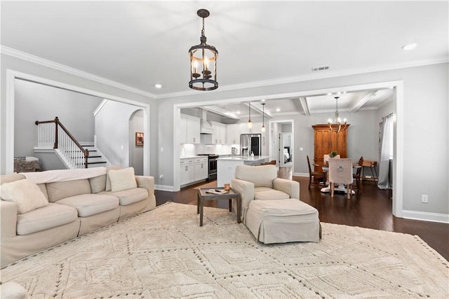 2409 Meadow Cove Rd, Auburn, AL 36832 - living area featuring a chandelier, ornamental molding, stairs, dark wood finished floors, and recessed lighting
