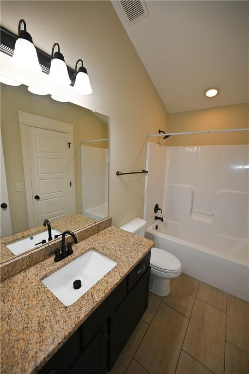 2228 Morgan Dr, Auburn, AL 36830 - dining room with ceiling fan, baseboards, and dark colored carpet