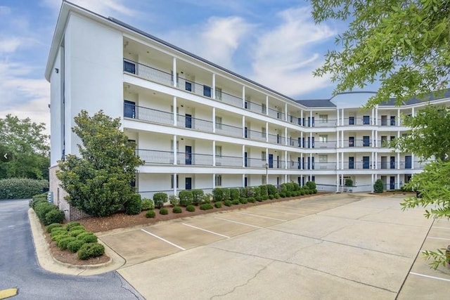 430 W Glenn Ave Unit 420, Auburn, AL 36832 - view of apartment building / complex featuring uncovered parking