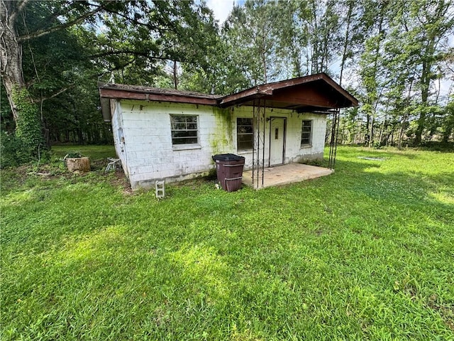 11485 US Highway 29, Tuskegee, AL 36803 - back of house featuring a yard