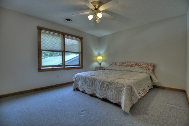 bedroom featuring ceiling fan and carpet flooring