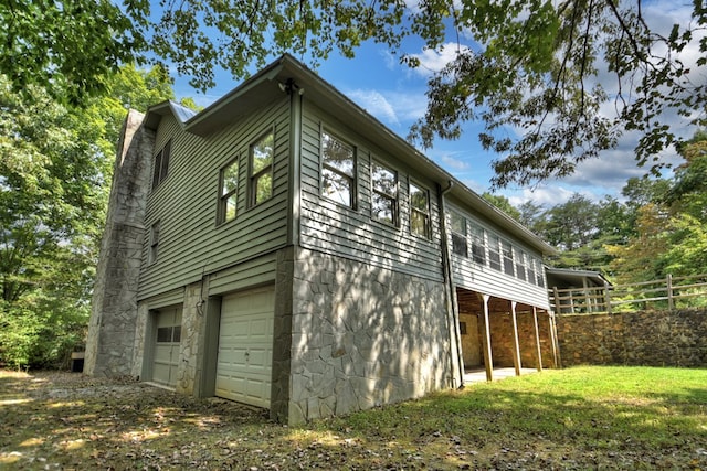 view of property exterior with a garage