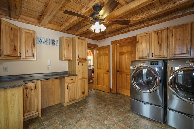 clothes washing area featuring cabinets, ceiling fan, separate washer and dryer, and wood ceiling