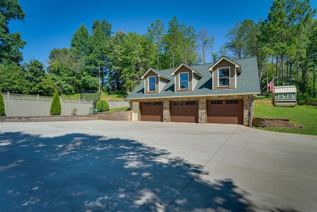 view of side of property featuring a garage