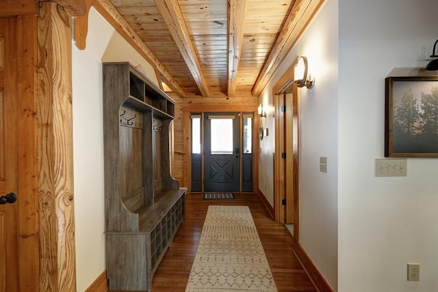 mudroom with hardwood / wood-style flooring, wooden ceiling, and beamed ceiling