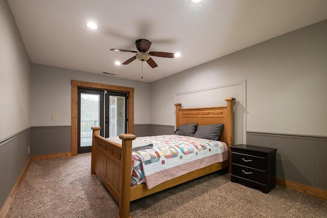 bedroom featuring carpet, access to exterior, ceiling fan, and french doors